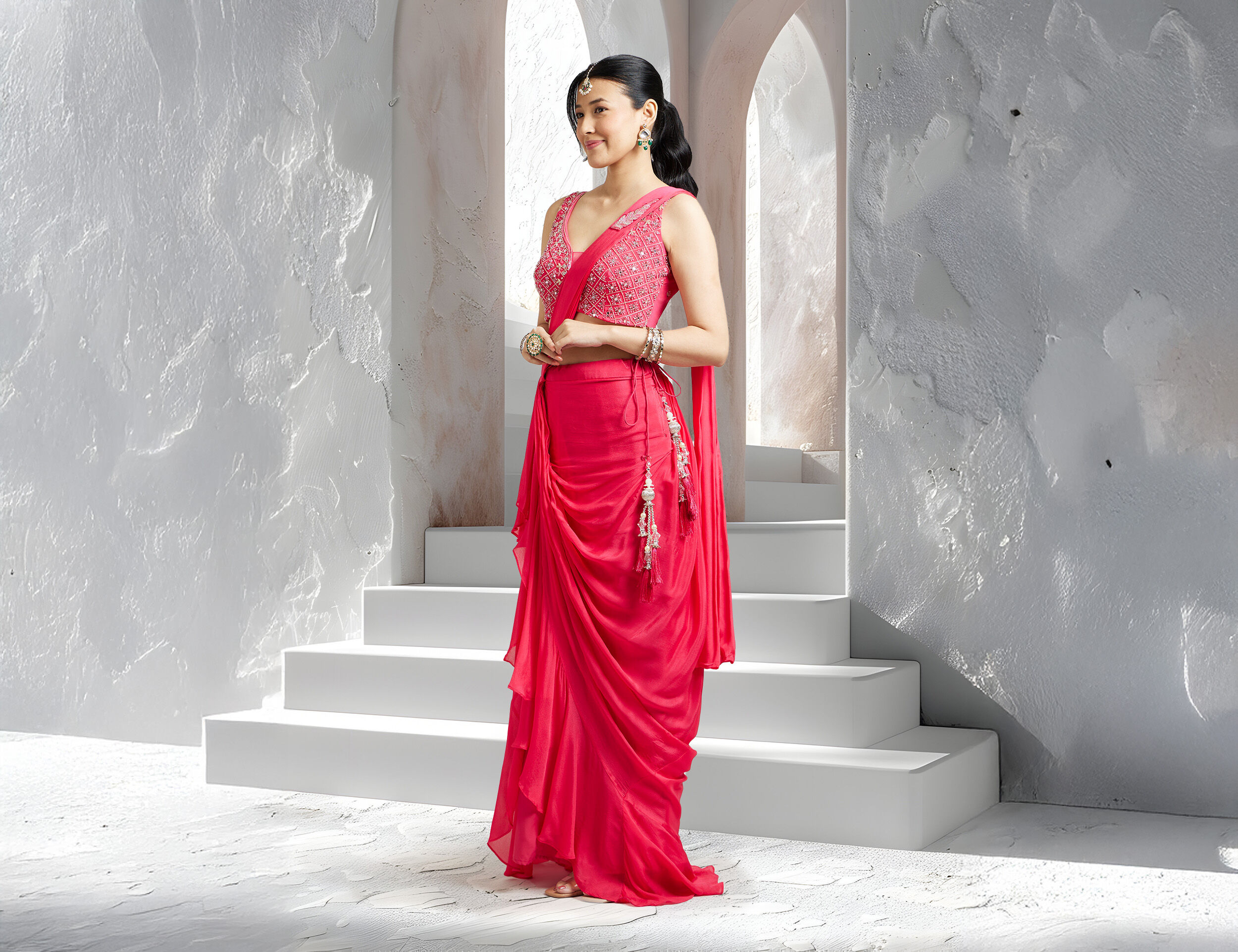 Elegant red saree representing the evolution of saree fashion